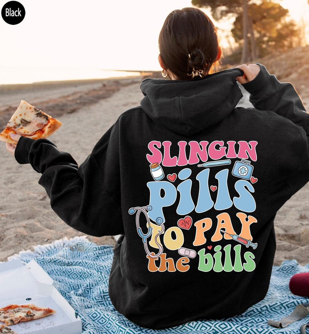 Slinging Pills To Pay The Bills Sweatshirt, Funny Nurse Shirt, RN Shirt For Women, Cute Nurse Tshirt, Nursing Student Graduation Gifts