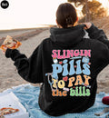 Slinging Pills To Pay The Bills Sweatshirt, Funny Nurse Shirt, RN Shirt For Women, Cute Nurse Tshirt, Nursing Student Graduation Gifts