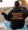 Somebody's Bombass Esthetician Sweatshirt | Women's Esthetician Shirt, Plastic Surgeon Gift, Cosmetologist Gifts, New Esthetician Gift