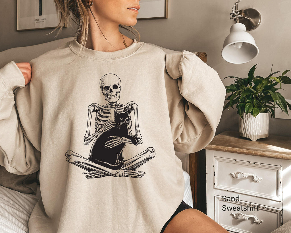 Skeleton Holding Cat Sweatshirt, Skeleton And Black Cat Shirt, Spooky Cat Lady Tee, Gothic Cat Owner Hoodie, Trendy Cat Mama Gift