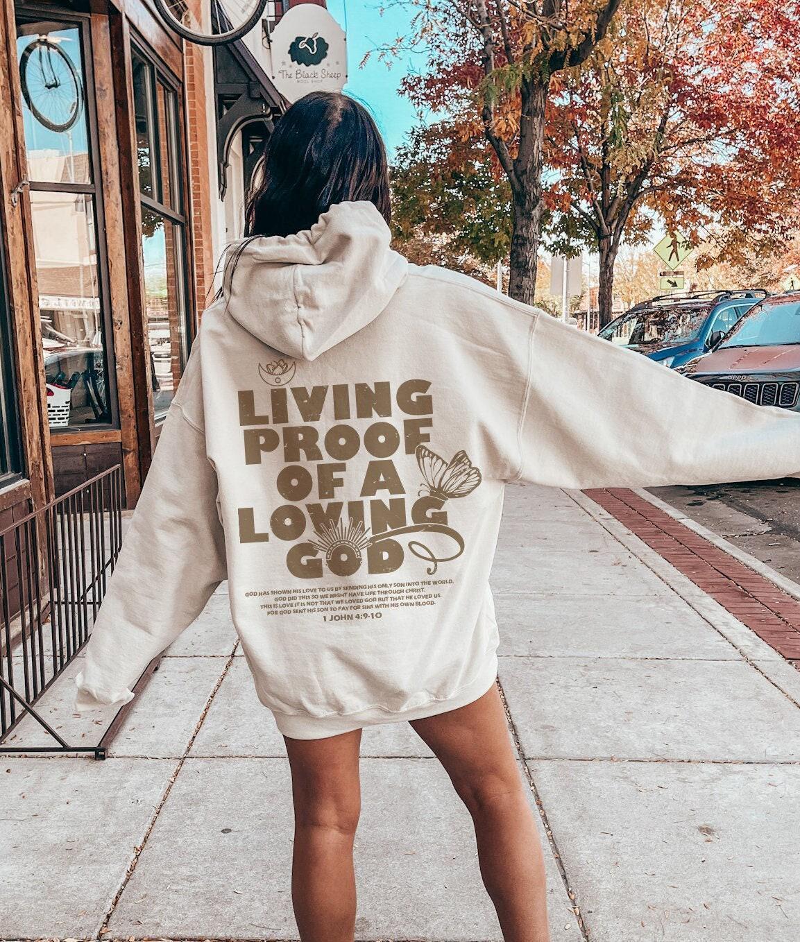 Living proof of a loving god Hoodie | comfy hoodie, faith hope love, bible verse, shop for the one, christian hoodie, christian clothing