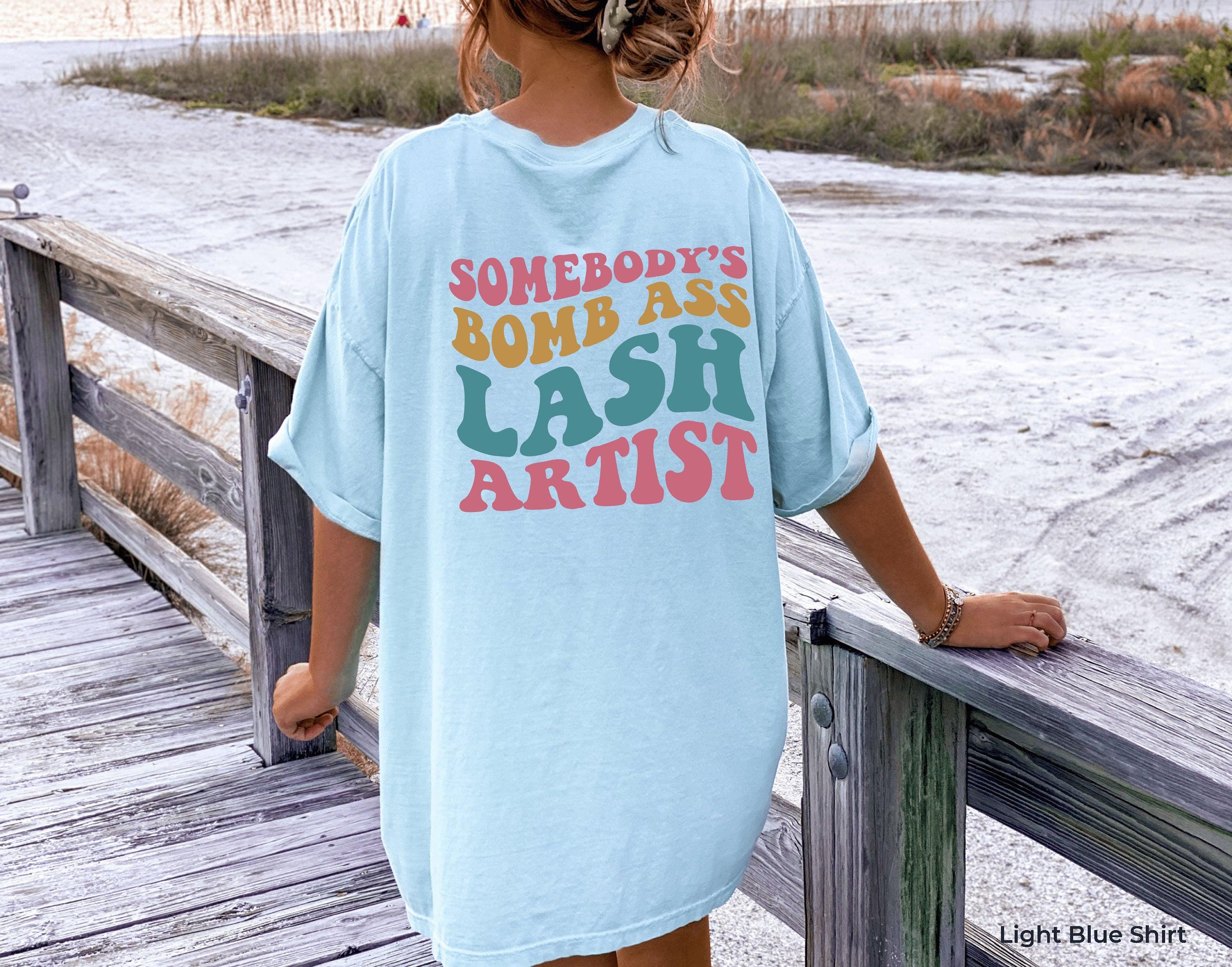 Somebody's Bomb Ass Lash Artist Sweatshirt | Lash Tech Shirt, Esthetician Hoodie, Eyelash Tech Gift, Aesthetician Sweater