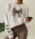 Custom Leopard Bow Sweatshirt with Names, Personalized Family Name Hoodie, Leopard Print T-Shirt on Sleeve, Cute Cheetah Lover Gift
