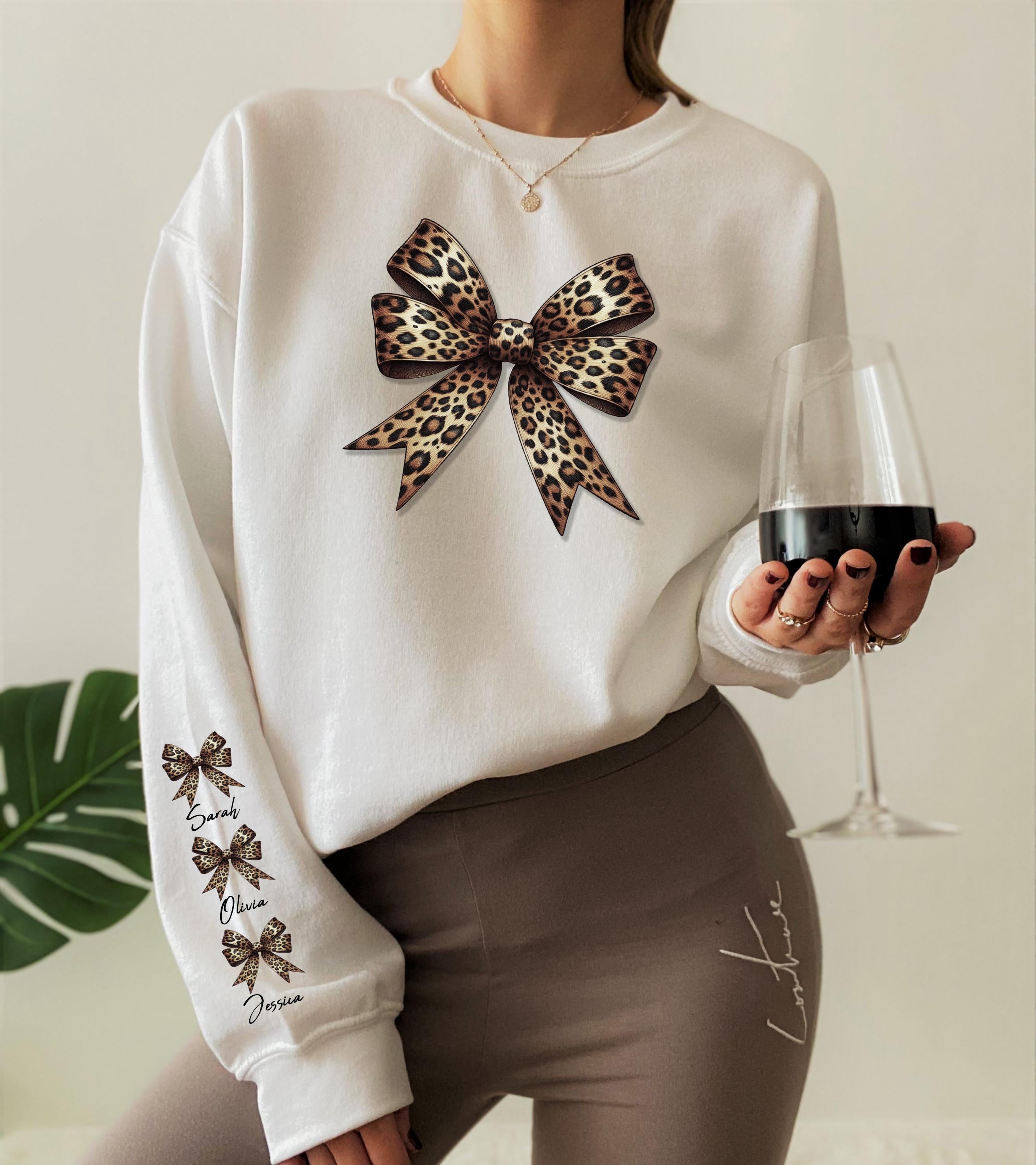 Custom Leopard Bow Sweatshirt with Names, Personalized Family Name Hoodie, Leopard Print T-Shirt on Sleeve, Cute Cheetah