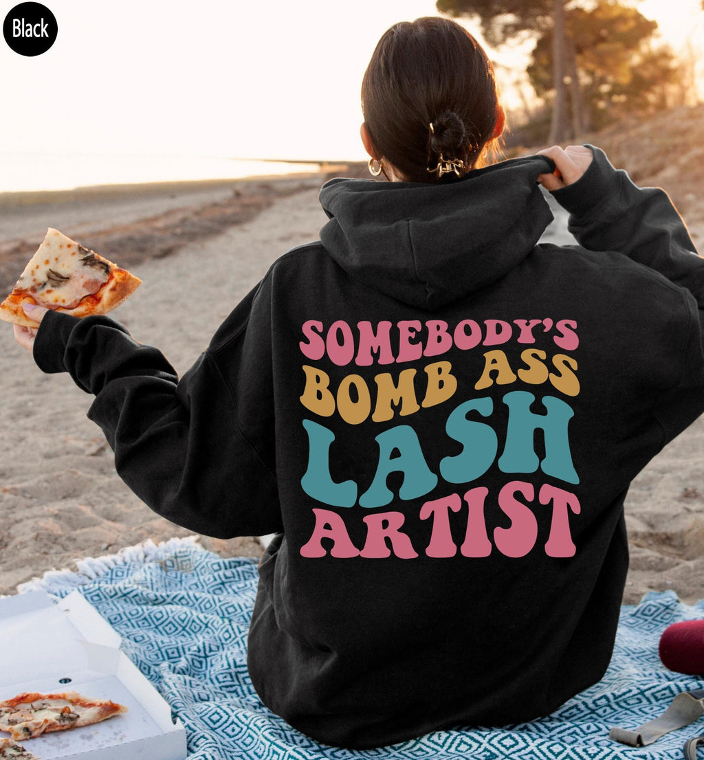 Somebody's Bomb Ass Lash Artist Sweatshirt | Lash Tech Shirt, Esthetician Hoodie, Eyelash Tech Gift, Aesthetician Sweater