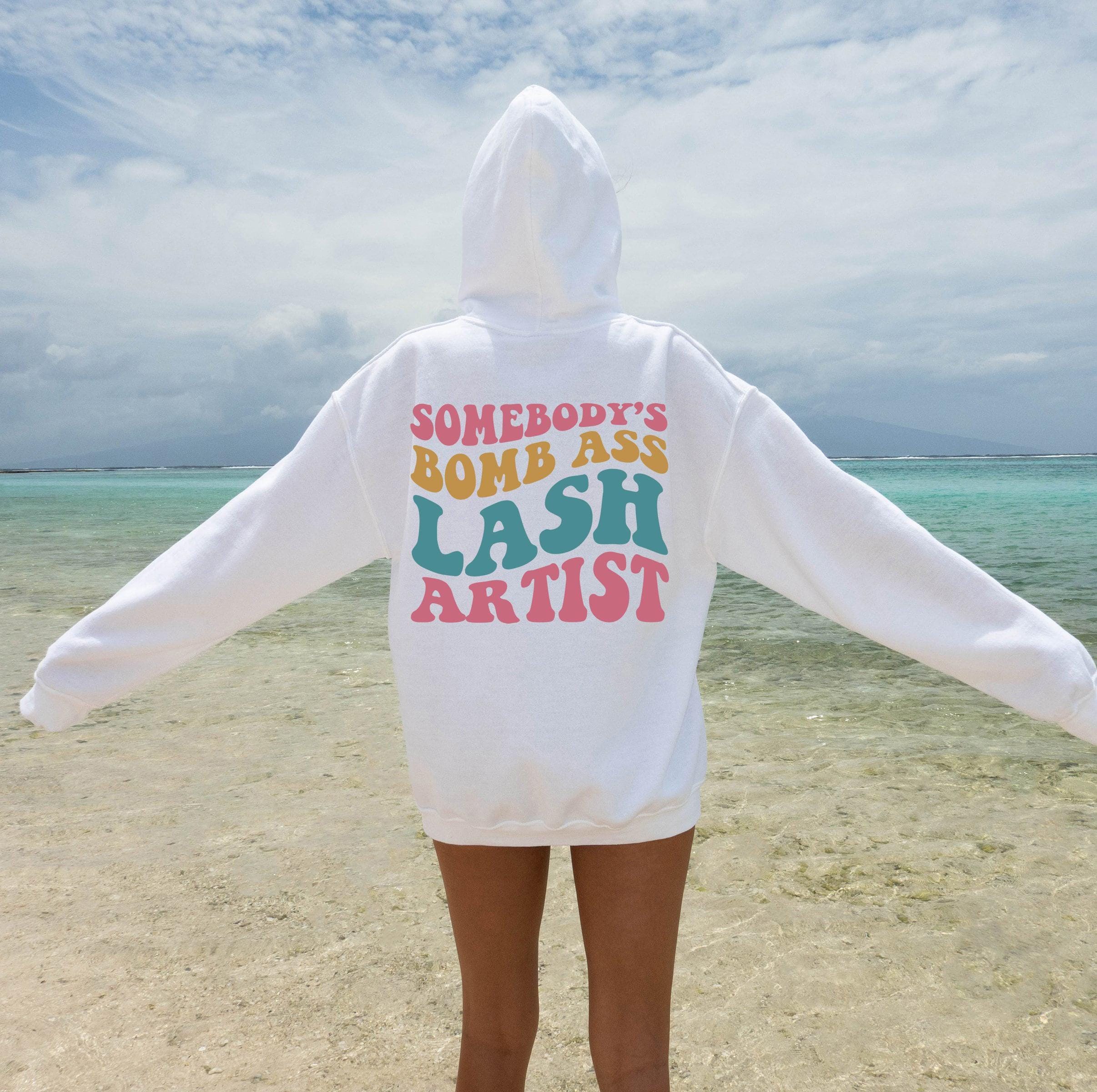 Somebody's Bomb Ass Lash Artist Sweatshirt | Lash Tech Shirt, Esthetician Hoodie, Eyelash Tech Gift, Aesthetician Sweater